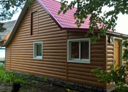 Сайдинг Бревно цвет Золотой дуб ECOSTEEL 0,5